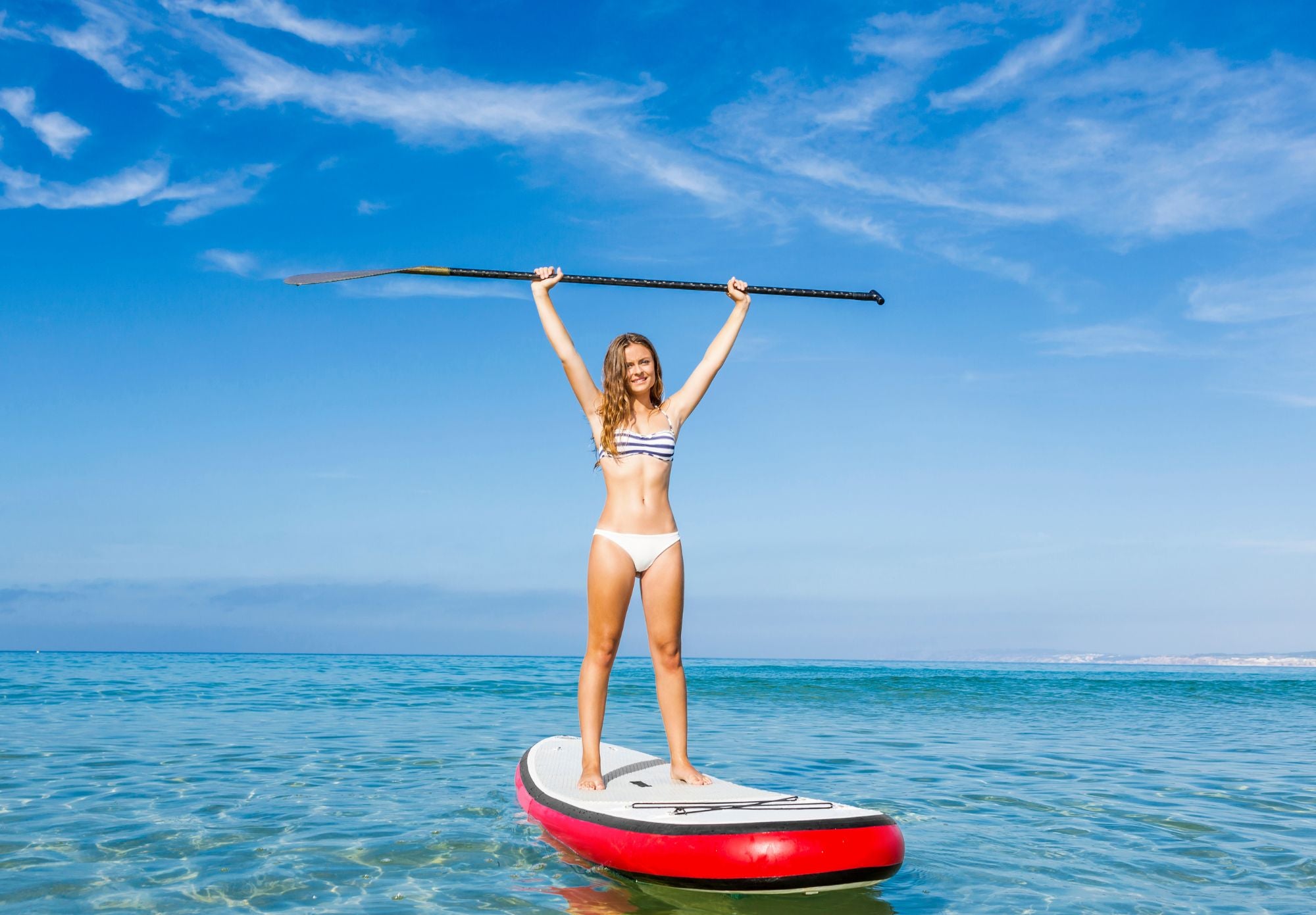 Paddle Boarding Paradise: Core Strengthening and Serenity on the Water